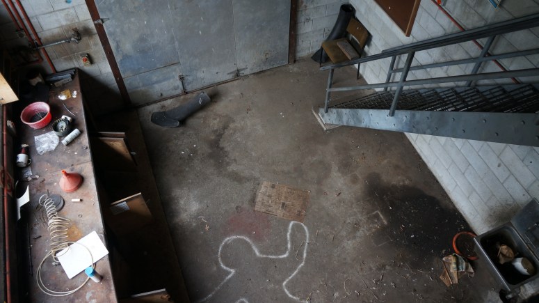 Workshop, with a murder chalk scene?